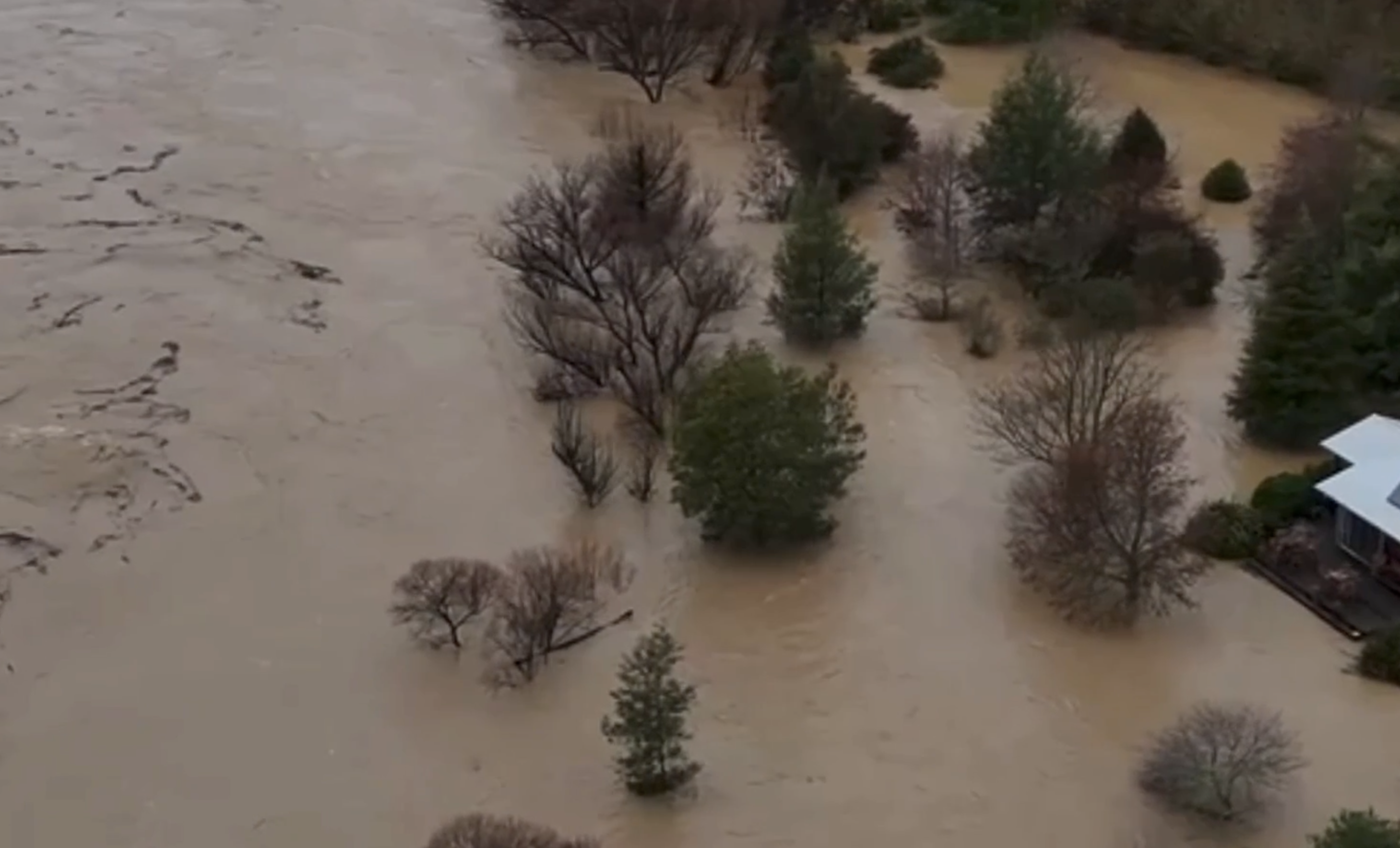 Flooded property with barn